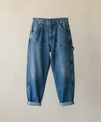 Mode Of One blue barrel relaxed-fit carpenter jeans shown from the front, highlighting the relaxed shape and utility pockets.